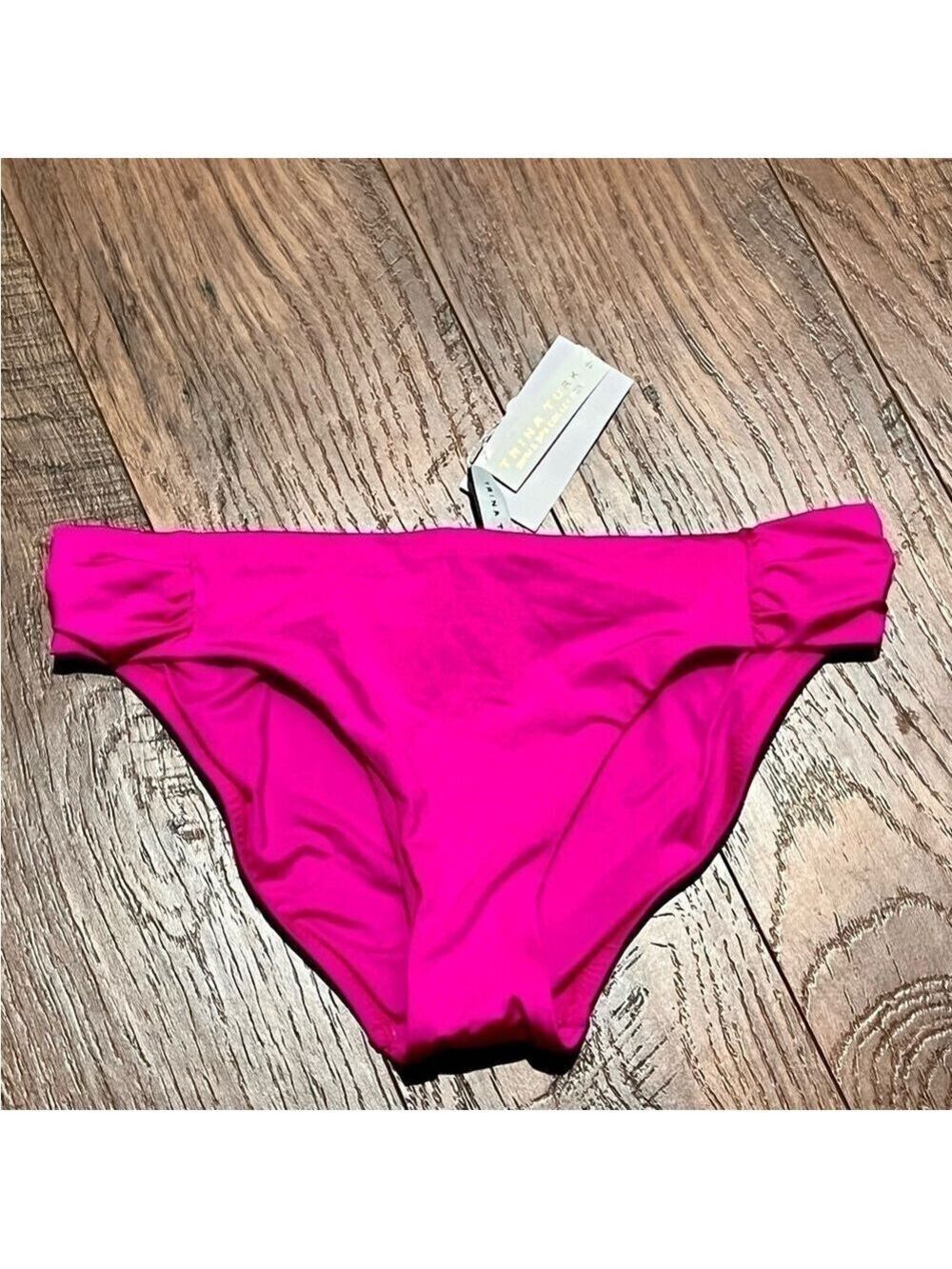 Trina TURK hot pink swim bottoms. Size 8